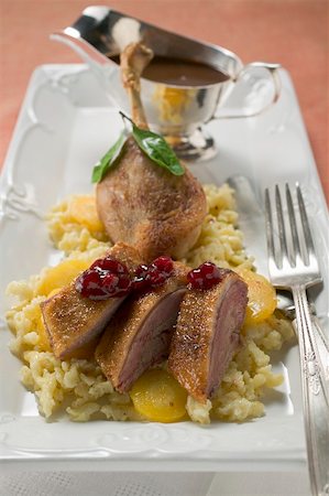 simsearch:659-01857024,k - Pieces of roast goose on rice with carrots Stock Photo - Premium Royalty-Free, Code: 659-01865557