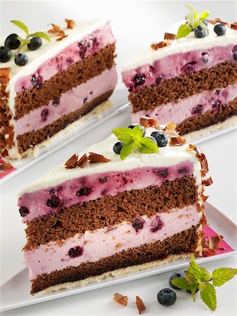 simsearch:659-01848790,k - Three pieces of chocolate blueberry cake Stock Photo - Premium Royalty-Free, Code: 659-01865723