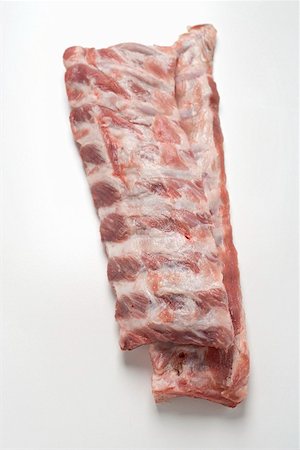rib - Fresh pork ribs Foto de stock - Sin royalties Premium, Código: 659-01867482