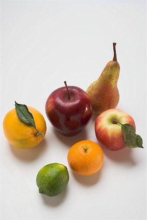 simsearch:659-07610418,k - Apples, pear and citrus fruit Stock Photo - Premium Royalty-Free, Code: 659-01861537