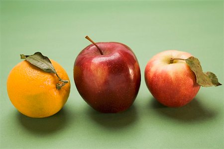 simsearch:659-07610418,k - Two red apples, varieties Stark and Elstar, and orange Stock Photo - Premium Royalty-Free, Code: 659-01861531
