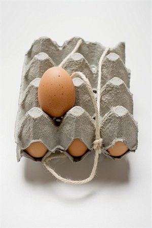 simsearch:659-03536847,k - Brown eggs in an egg box Foto de stock - Sin royalties Premium, Código: 659-01861637
