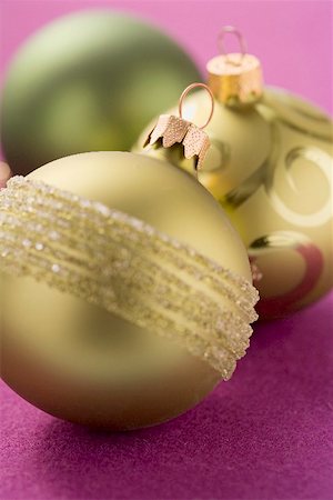 Three different Christmas baubles (green and gold) Stock Photo - Premium Royalty-Free, Code: 659-02214111