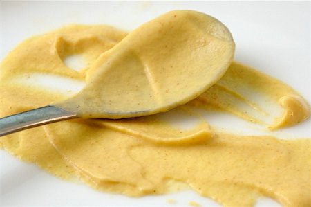 Mustard with spoon Foto de stock - Sin royalties Premium, Código: 659-02211273