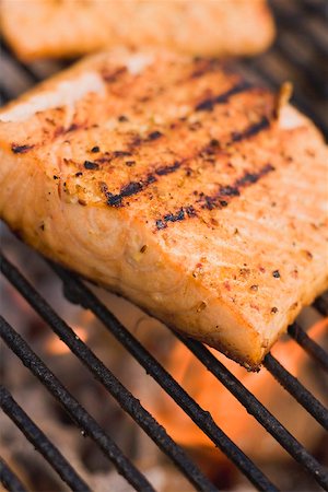 fish filet - Salmon fillets on a barbecue Stock Photo - Premium Royalty-Free, Code: 659-02211834