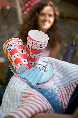 Picnic things for the 4th of July woman in background Foto de stock - Sin royalties Premium, Código: 659-02212047
