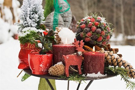 Christmas decorations on table out of doors Stock Photo - Premium Royalty-Free, Code: 659-02212434