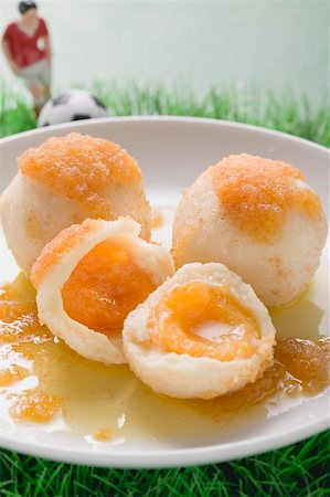 simsearch:659-02213122,k - Apricot dumplings with football figure and football Stock Photo - Premium Royalty-Free, Code: 659-02213115