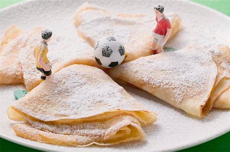 simsearch:659-02213122,k - Crêpes with icing sugar, football figures and football Stock Photo - Premium Royalty-Free, Code: 659-02213111