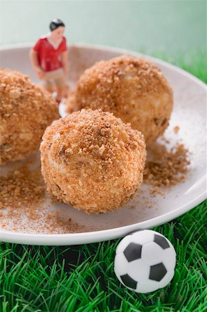 simsearch:659-01850806,k - Apricot dumplings with football figure and football Stock Photo - Premium Royalty-Free, Code: 659-02213113