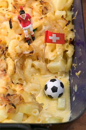 simsearch:659-02213122,k - Cheese & onion pasta bake, football figure, football, flag (detail) Stock Photo - Premium Royalty-Free, Code: 659-02213145