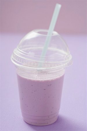 purple cocktail - Blueberry shake in plastic cup with straw Stock Photo - Premium Royalty-Free, Code: 659-02213266