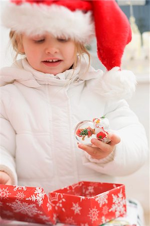 simsearch:659-03526649,k - Small girl pleased with Christmas gift Stock Photo - Premium Royalty-Free, Code: 659-03524972