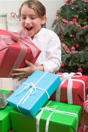 simsearch:659-03526649,k - Girl with lots of Christmas gifts Stock Photo - Premium Royalty-Free, Code: 659-03525035