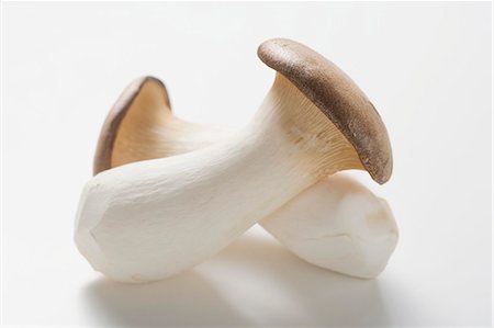 simsearch:659-03526248,k - Two king oyster mushrooms Stock Photo - Premium Royalty-Free, Code: 659-03526247