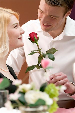 simsearch:659-03526649,k - Man giving woman a red rose Stock Photo - Premium Royalty-Free, Code: 659-03527447