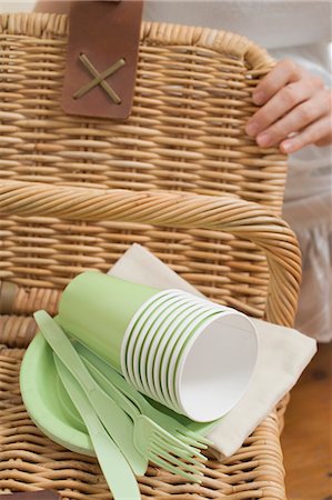 picnic basket - Woman with picnic basket and picnicware Stock Photo - Premium Royalty-Free, Code: 659-03527871