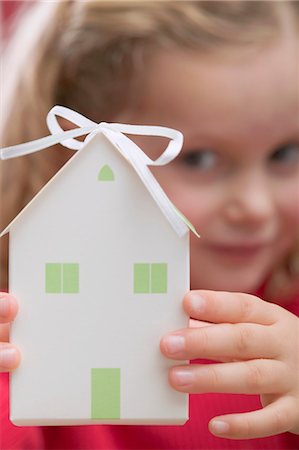 simsearch:659-03526649,k - Small girl holding paper house Stock Photo - Premium Royalty-Free, Code: 659-03528128