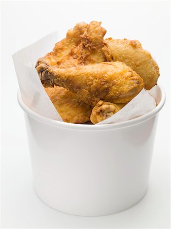 Breaded chicken pieces to take away Foto de stock - Sin royalties Premium, Código: 659-03528571