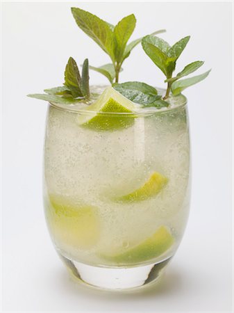 simsearch:659-01850296,k - Mojito with lime and mint Stock Photo - Premium Royalty-Free, Code: 659-03529450
