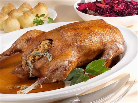 simsearch:659-01857024,k - Roast goose with red cabbage and potato dumplings Stock Photo - Premium Royalty-Free, Code: 659-03529908