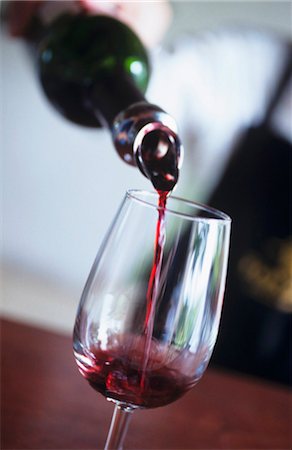 pourer - Pouring red wine Stock Photo - Premium Royalty-Free, Code: 659-03521822