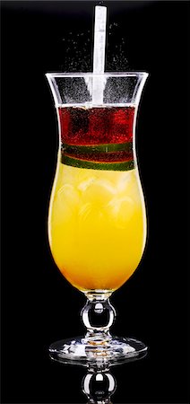 simsearch:652-03802277,k - A glass of orange cocktail Stock Photo - Premium Royalty-Free, Code: 659-03523702