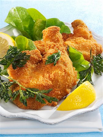 Viennese fried chicken with parsley Stock Photo - Premium Royalty-Free, Code: 659-03523738