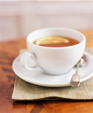 single lemon - A cup of tea with lemon Stock Photo - Premium Royalty-Free, Code: 659-03523984