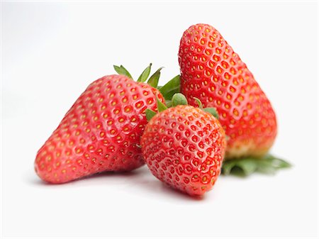 strawberries - Three strawberries Stock Photo - Premium Royalty-Free, Code: 659-03534086