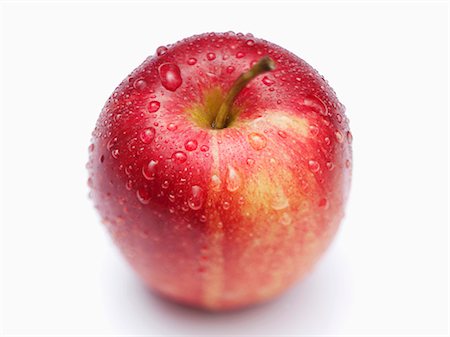 Gala apple with drops of water Stock Photo - Premium Royalty-Free, Code: 659-03534081