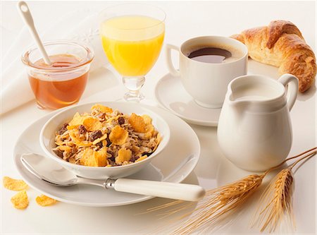 Breakfast: muesli, honey, orange juice, coffee & croissant Stock Photo - Premium Royalty-Free, Code: 659-03534146