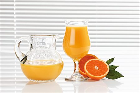 simsearch:659-06495307,k - Orange juice in glass and glass jug Stock Photo - Premium Royalty-Free, Code: 659-03535985