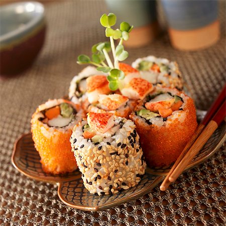 Lobster Sushi Rolls on a Plate; Chopsticks Stock Photo - Premium Royalty-Free, Code: 659-03536208