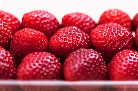 food in containers - Strawberries in plastic punnet (detail) Stock Photo - Premium Royalty-Free, Code: 659-03536952