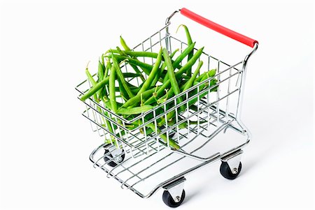 shopping cart white background - Green beans in toy shopping trolley Stock Photo - Premium Royalty-Free, Code: 659-03536998