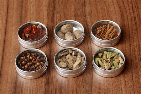 food in containers - Assorted spices in small tins Stock Photo - Premium Royalty-Free, Code: 659-03537050