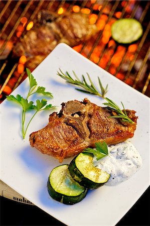simsearch:659-06186142,k - Barbecued lamb chop with cucumber and garlic & olive cream Stock Photo - Premium Royalty-Free, Code: 659-03537208
