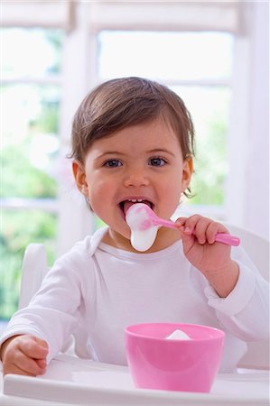 Little girl eating Stock Photo - Premium Royalty-Free, Code: 659-03537355