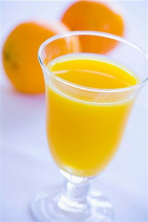 simsearch:659-06495307,k - A glass of orange juice Stock Photo - Premium Royalty-Free, Code: 659-03537362