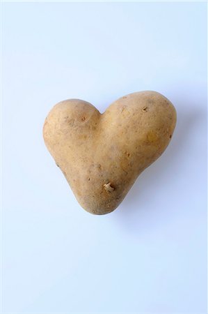 raw potato - Heart-shaped potato Stock Photo - Premium Royalty-Free, Code: 659-03537533