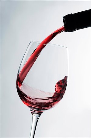 Pouring red wine Stock Photo - Premium Royalty-Free, Code: 659-03537885