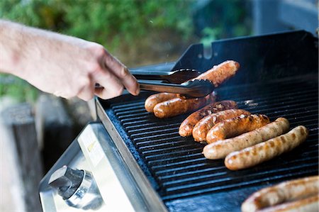 Sausages on a barbecue Stock Photo - Premium Royalty-Free, Code: 659-03530031