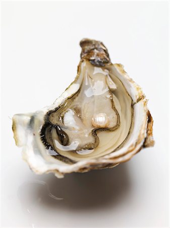 simsearch:659-03535097,k - Half an oyster with pearl Foto de stock - Sin royalties Premium, Código: 659-03530463
