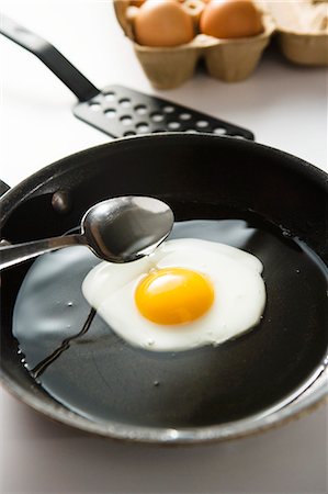 egg dish - Fried Egg in Skillet Stock Photo - Premium Royalty-Free, Code: 659-03530497