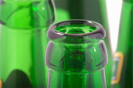Green beer bottle necks (close-up) Stock Photo - Premium Royalty-Free, Code: 659-03531318