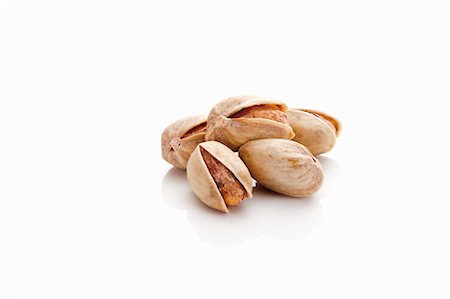 pistachio - Several pistachios (salted and roasted) Stock Photo - Premium Royalty-Free, Code: 659-03531411