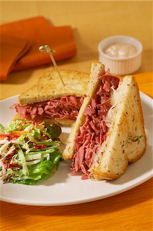 Corned Beef Sandwich with Side Salad Stock Photo - Premium Royalty-Free, Code: 659-03531926