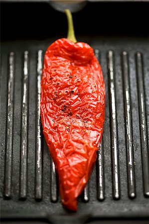 Red pepper in a grill frying pan Stock Photo - Premium Royalty-Free, Code: 659-03532003