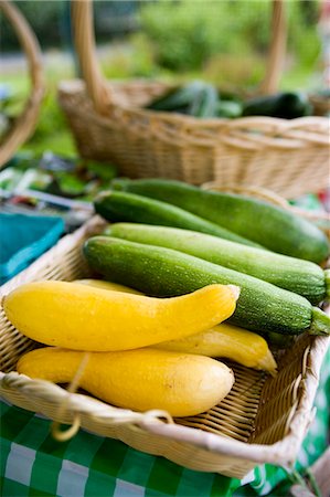 flower sale - Summer Squash and Zucchini in Basket at Farmer's Market Stock Photo - Premium Royalty-Free, Code: 659-03532054